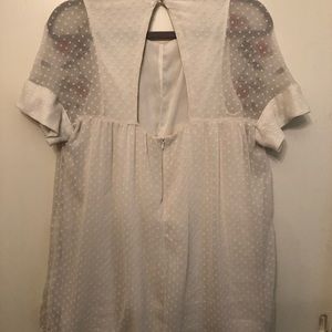 White romper dress with flower detail